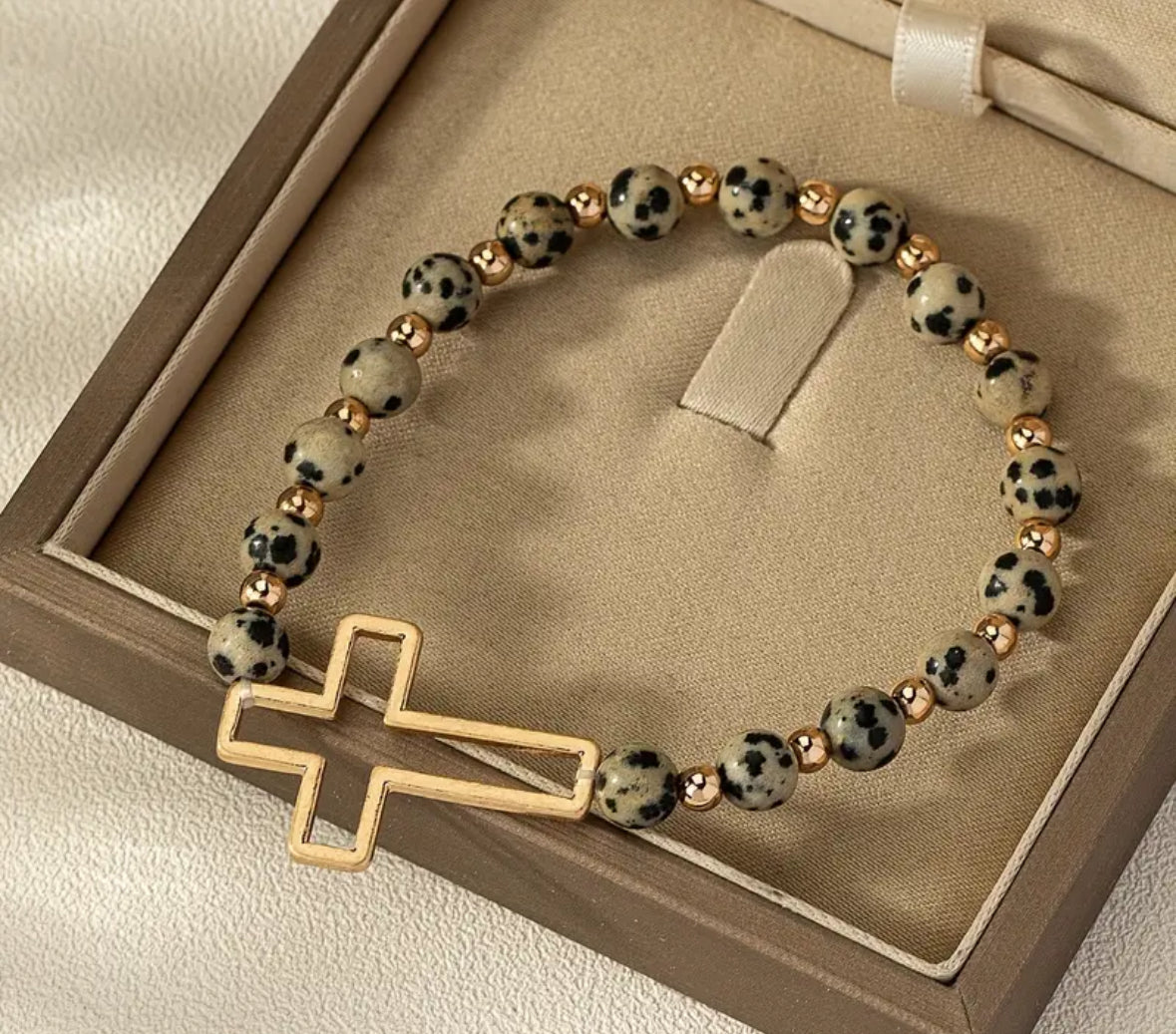 Spotted stone cross bracelet