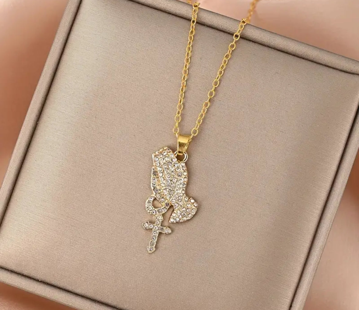 Praying hands with cross necklace